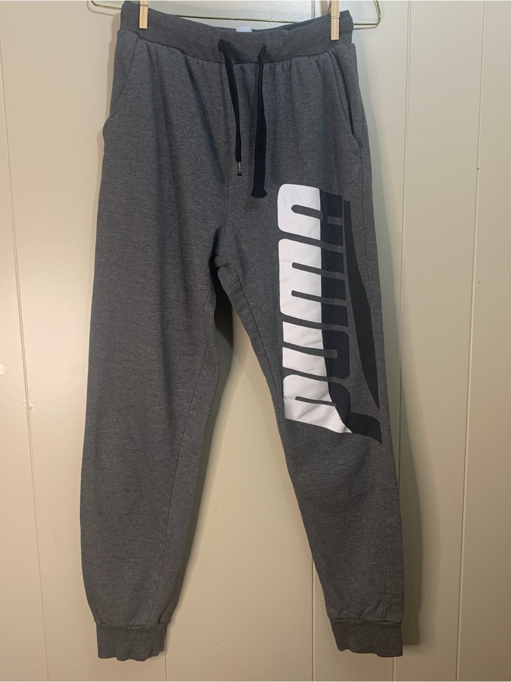 Boy’s large Puma Gray Sweatpants with Black and White Logo Patch